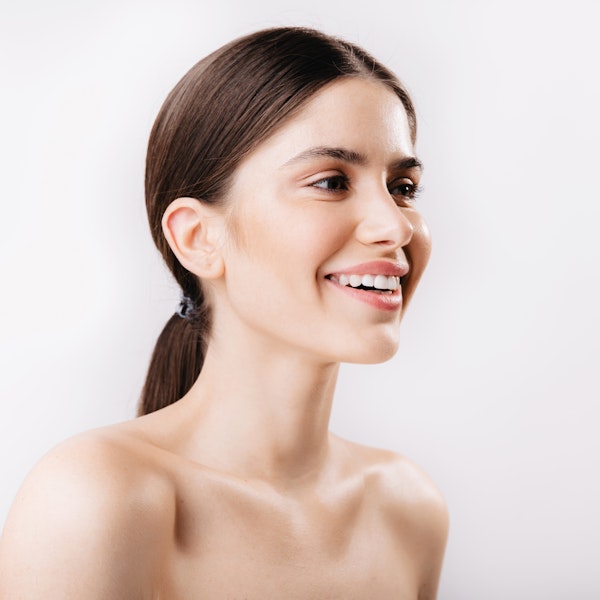 Woman looking to the side smiling